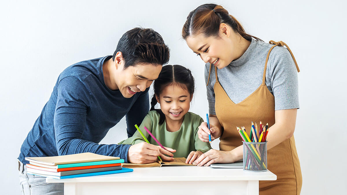 What is an Individualized Education Program, image of family working on school work.